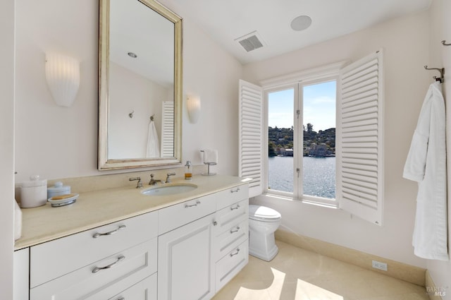72 Lagoon Rd, Belvedere, CA 94920 - bathroom featuring toilet, vanity, and tile patterned floors