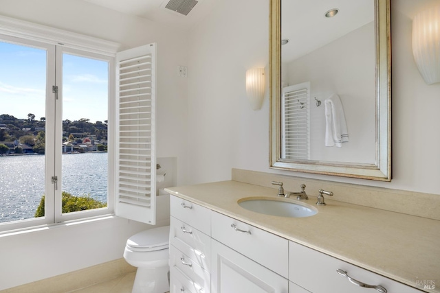72 Lagoon Rd, Belvedere, CA 94920 - bathroom with vanity, toilet, and tile patterned flooring