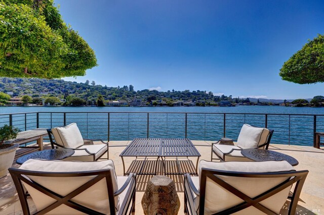 72 Lagoon Rd, Belvedere, CA 94920 - view of patio / terrace with an outdoor living space and a water view
