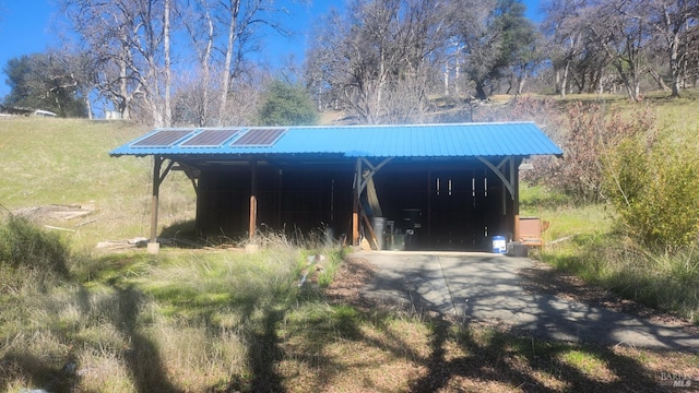 view of pole building featuring a detached carport