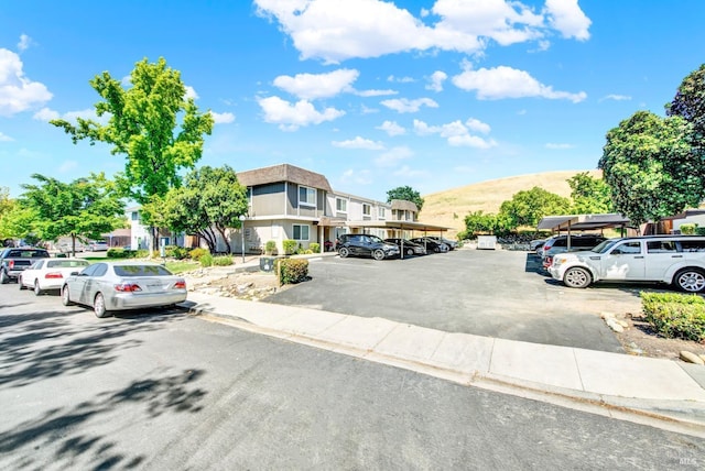 view of street featuring a residential view and sidewalks