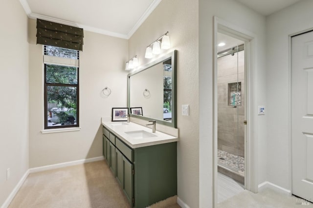 bathroom with baseboards, crown molding, a stall shower, and a sink