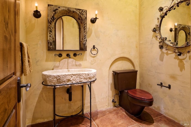 bathroom featuring toilet