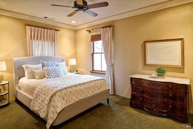carpeted bedroom featuring visible vents, crown molding, and ceiling fan