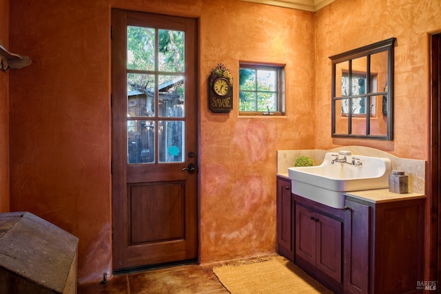 bathroom featuring vanity and a wealth of natural light