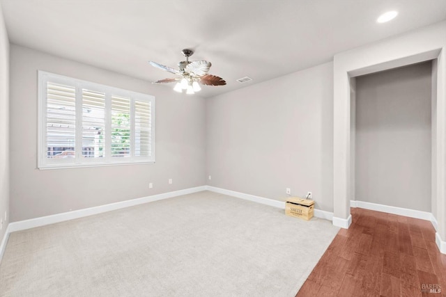 unfurnished bedroom with wood finished floors, visible vents, baseboards, ceiling fan, and recessed lighting