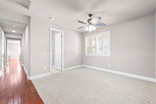 unfurnished bedroom featuring ceiling fan, recessed lighting, baseboards, and wood finished floors
