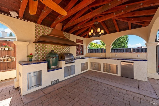 view of patio / terrace featuring a gazebo, exterior kitchen, a grill, and visible vents