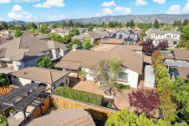 aerial view with a mountain view and a residential view