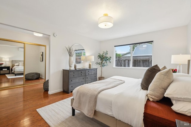 bedroom with wood finished floors