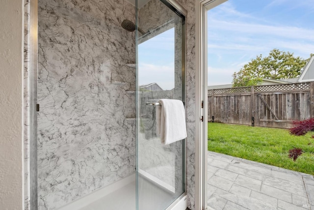 bathroom with a shower stall