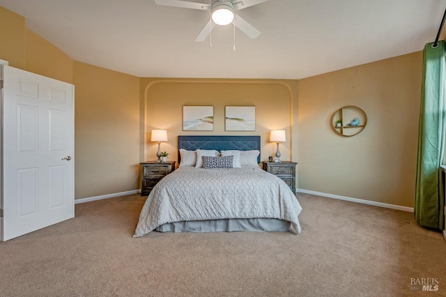 bedroom featuring carpet floors, baseboards, and ceiling fan