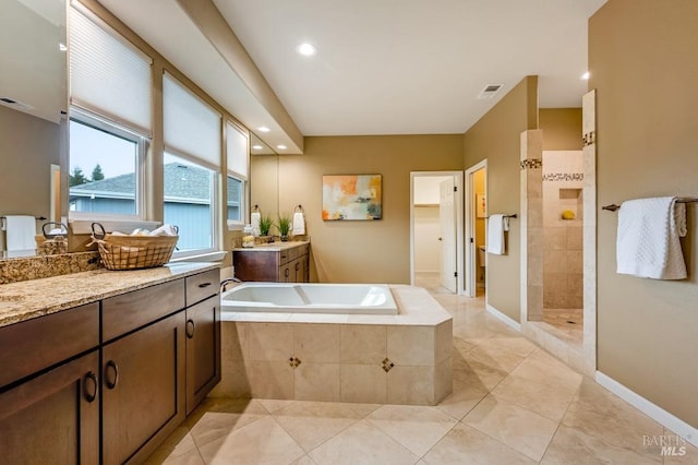 7580 Meadowlark Dr, Sebastopol, CA 95472 - full bathroom featuring a walk in shower, a garden tub, vanity, tile patterned flooring, and recessed lighting