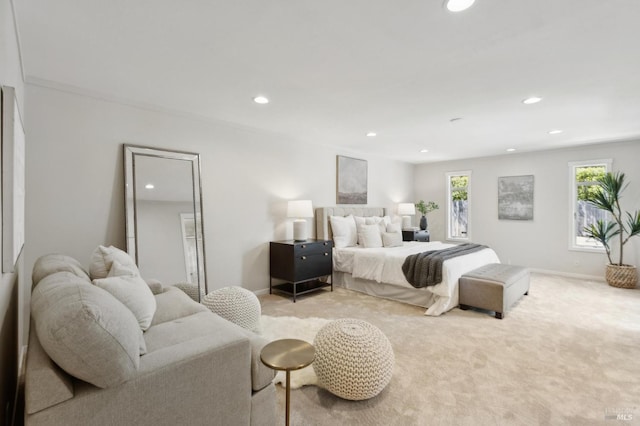 bedroom with recessed lighting, baseboards, and light colored carpet