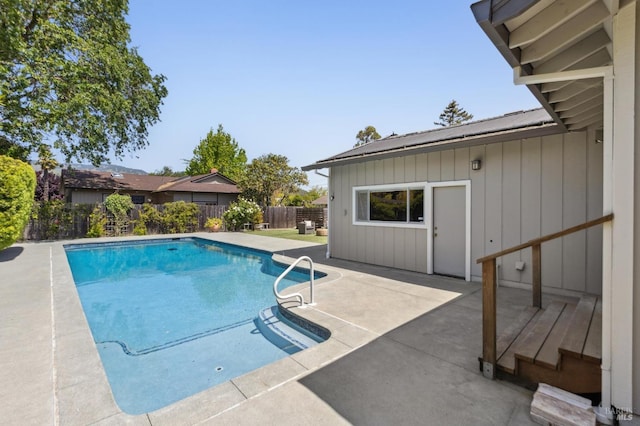 view of pool featuring a fenced in pool, a patio area, and fence