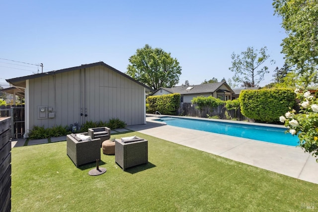 view of swimming pool with a fenced in pool, a fenced backyard, an outdoor hangout area, a yard, and a patio