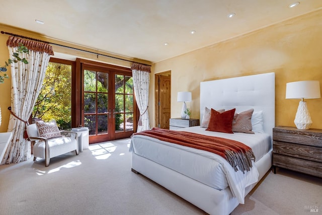 bedroom with carpet flooring, recessed lighting, access to exterior, and french doors