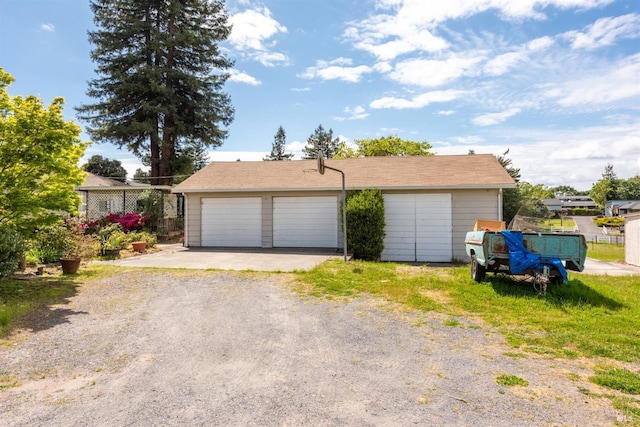 detached garage with fence