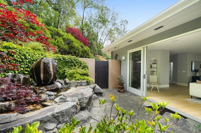exterior space with a gate