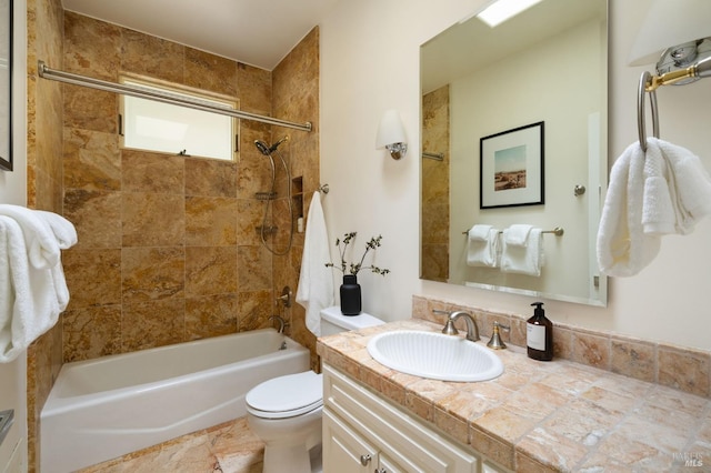 full bath with vanity, toilet, and shower / washtub combination