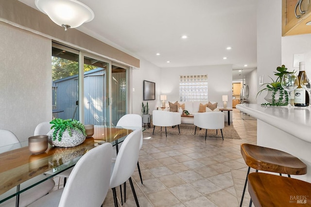 dining space with recessed lighting