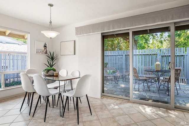 tiled dining space with plenty of natural light