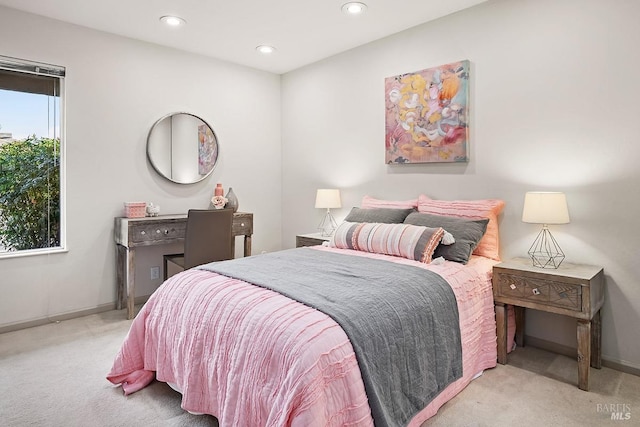 carpeted bedroom featuring recessed lighting and baseboards