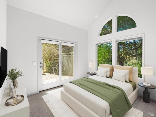 bedroom with high vaulted ceiling, access to exterior, and light carpet
