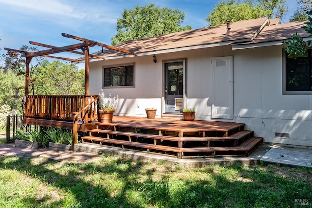 back of house with a shingled roof, crawl space, and a deck