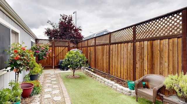 view of yard featuring a fenced backyard