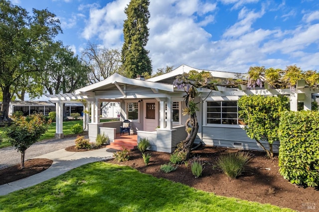 2855 Old Gravenstein Hwy, Sebastopol, CA 95472 - view of front of home with a pergola, covered porch, and a front yard