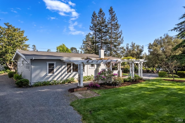 2855 Old Gravenstein Hwy, Sebastopol, CA 95472 - view of front of house with a pergola, a front lawn, and a chimney
