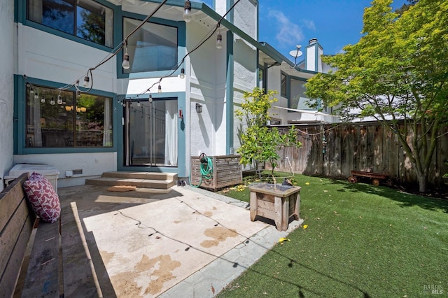 exterior space with fence and entry steps