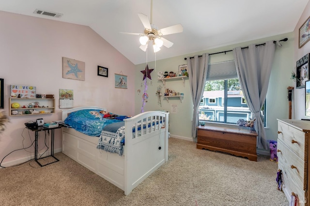 carpeted bedroom featuring ceiling fan, vaulted ceiling, and visible vents