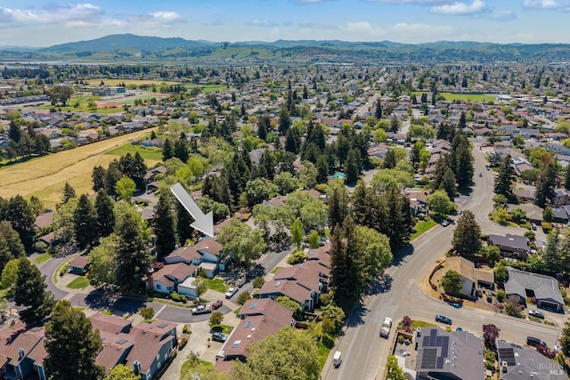 aerial view featuring a residential view and a mountain view