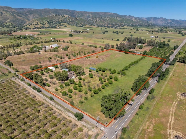 aerial view featuring a rural view and a mountain view