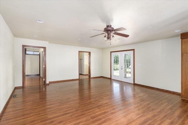 unfurnished room with french doors, a ceiling fan, wood finished floors, baseboards, and recessed lighting