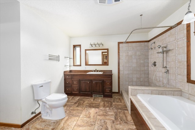 full bathroom featuring vanity, toilet, a bathtub, visible vents, and tiled shower