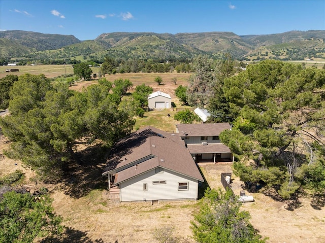 bird's eye view featuring a rural view and a mountain view