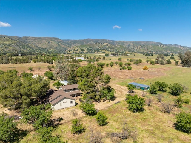 aerial view with a mountain view and a rural view