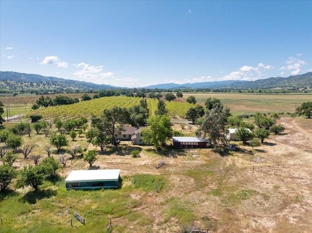 aerial view featuring a rural view and a mountain view