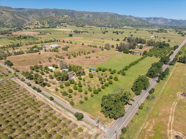 drone / aerial view with a rural view and a mountain view
