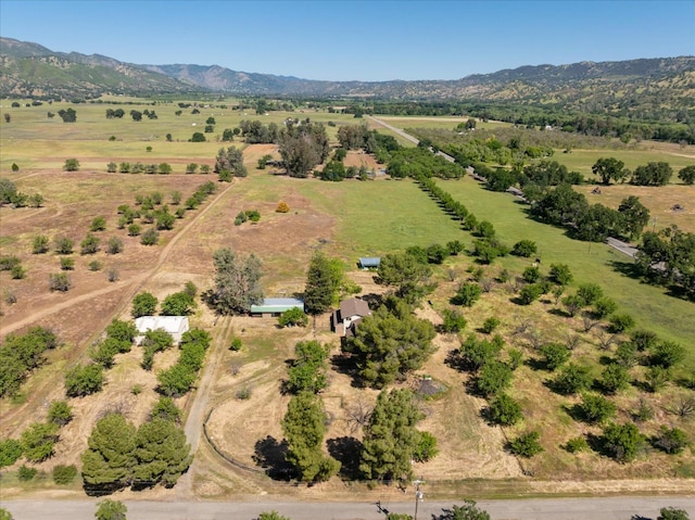 drone / aerial view with a rural view and a mountain view
