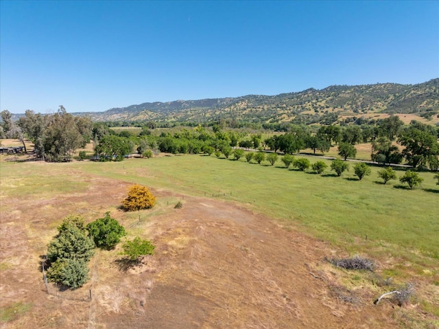 property view of mountains featuring a rural view