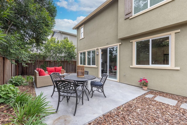 view of patio featuring a fenced backyard and an outdoor hangout area