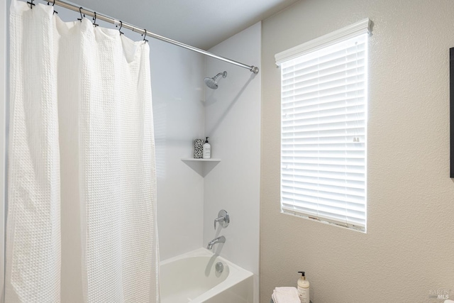 full bathroom with shower / tub combo