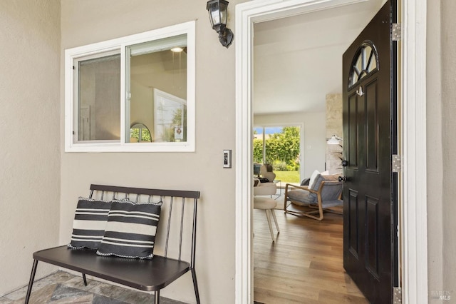 exterior space with wood finished floors