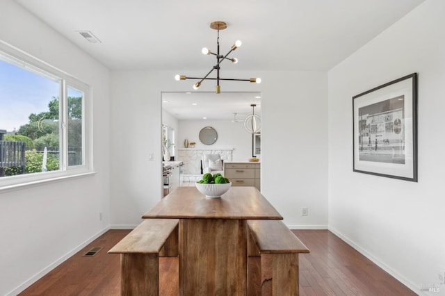 9 Monroe Ct, Novato, CA 94947 - dining room featuring baseboards, visible vents, dark wood-type flooring, and a notable chandelier