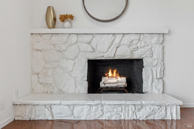 9 Monroe Ct, Novato, CA 94947 - details with baseboards, wood finished floors, and a fireplace