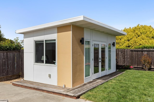 9 Monroe Ct, Novato, CA 94947 - view of property exterior with french doors, a lawn, and a fenced backyard